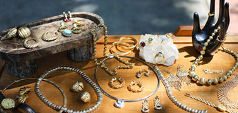 Jewelry beautifully displayed on a wood tabletop 